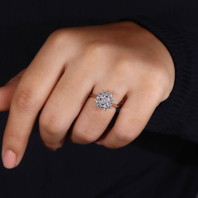 Hand gracefully displaying the lab grown diamond ring in rose gold by Diamondrensu