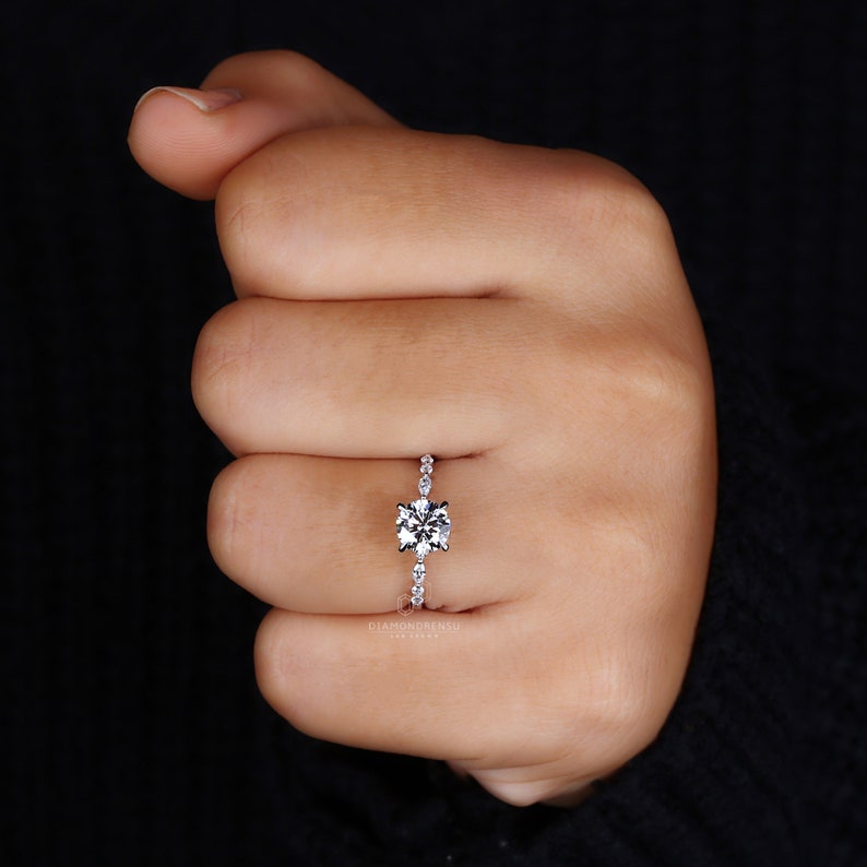 Hand displaying the brilliance of a CVD Diamond Ring, highlighting the exquisite pave band.