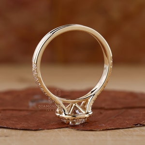Round Diamond Halo Engagement Ring, a quintessential Wedding Gift, shimmering in yellow gold