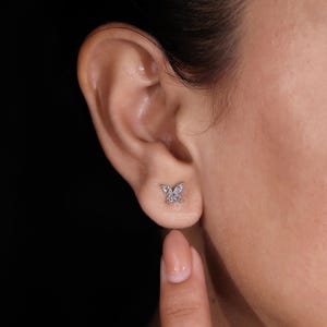 Marquise and round diamond earrings for a sparkling touch.