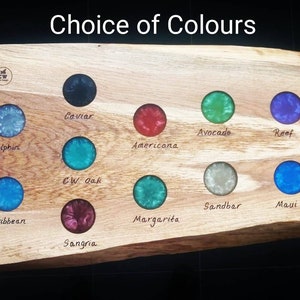 May include: A wooden board with a variety of resin colors, including Ocean, Dolphin, Fire Truck, Pearl, Caribbean, Caviar, Avocado, Reef, Clear, Americana, CW Oak, Sandbar, Maui, Coral, Margarita, and Sangria. The board is labeled "Choice of Colours".