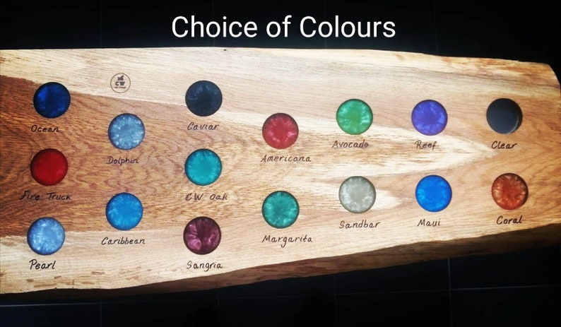 May include: A wooden board with a variety of resin colors, including Ocean, Dolphin, Fire Truck, Pearl, Caribbean, Caviar, Avocado, Reef, Clear, Americana, CW Oak, Sandbar, Maui, Coral, Margarita, and Sangria. The board is labeled "Choice of Colours".