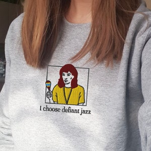 Embroidered Severance Sweatshirt | Helly R | Defiant jazz | Music dance experience | Lumon