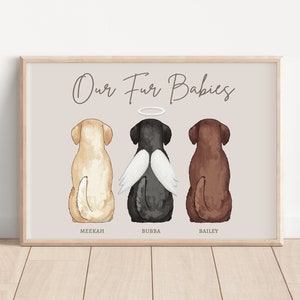May include: A watercolor painting of three dogs, a yellow lab, a black lab with angel wings, and a brown lab. The dogs are sitting in a row and the text "Our Fur Babies" is above them. The dogs are labeled "Meekah", "Bubba", and "Bailey".