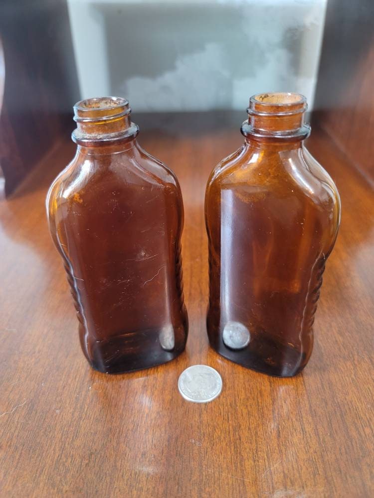 Vintage brown glass bottles. Etsy