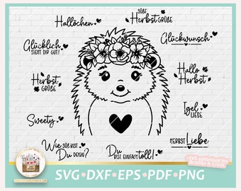 May include: A black and white digital design featuring a hedgehog with a flower crown and various autumn-themed phrases in German, including "Hallochen", "Glücklich", "Herbst", "Sweety", "Wie süß bist du denn?", "Du bist einfach toll!" and "Herbst Liebe".