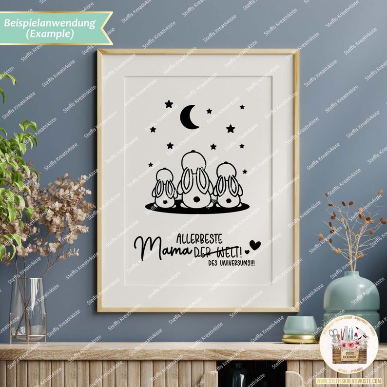 May include: A black and white illustration of three bunnies looking up at a crescent moon and stars. The text reads "Allerbeste Mama der Welt! Des Universums!!!"