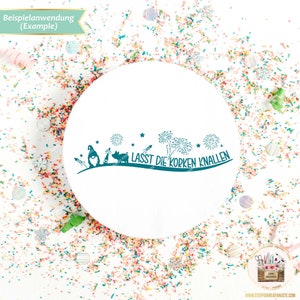 May include: A white round sticker with a teal design of gnomes, fireworks, and the text "LASST DIE KORKEN KNALLEN" on a white background with colorful confetti.