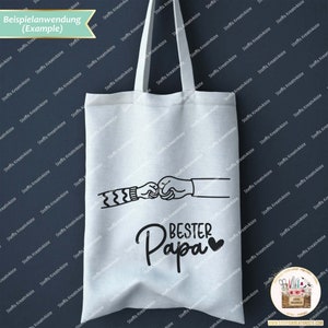 May include: A white tote bag with black text and a graphic of two fists bumping. The text reads "Best Papa" with a heart.