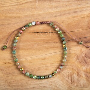 Handmade minimalist bracelet featuring 4mm faceted unakite beads, blending earthy green and pink tones. Adjustable design, perfect for a grounding, heart-centered accessory or a thoughtful, nature-inspired gift.