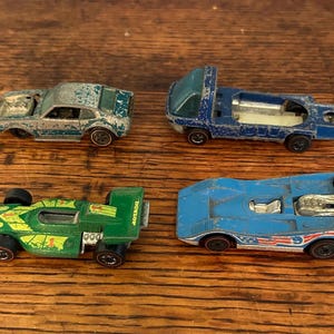 Set of 4 Vintage Hot Wheels Red Line Die Cast Cars
