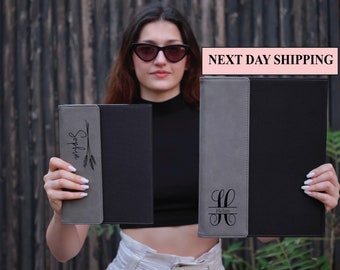 May include: Two personalized leatherette folders, one with the name "Sophia" and a wheat stalk design, the other with the initial "H" and the name "Helen" below.