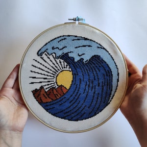 Wave landscape and minimalist mountain in cross stitch color in frame (23.5 cm)