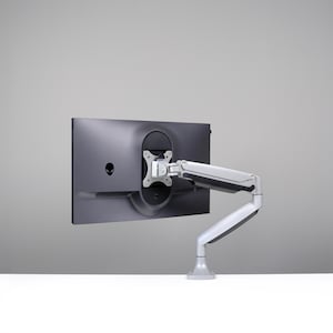 May include: A black computer monitor with a silver articulating arm mount. The monitor has a dark gray bezel and a circular mounting point on the back. The arm mount is attached to the monitor and has multiple joints for adjusting the monitor's position.