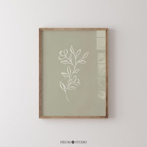 Sage green minimal botanical printable wall art featuring elegant floral line drawings in a muted green palette. This digital artwork blends minimalist aesthetics with modern decor, perfect for stylish apartments, living rooms, and gallery walls. Available as a high-resolution digital download for instant printing