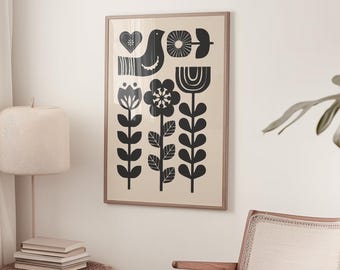 May include: A framed wall art print featuring a beige background with black graphic illustrations of a bird, a heart, and three stylized flowers on long stems. The text FIRUM STUDIO is printed in small white letters at the bottom center.