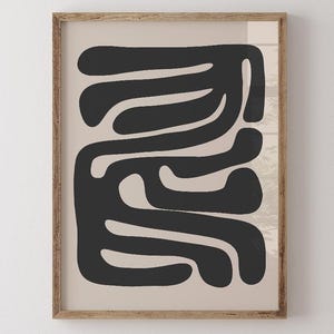 Beige and black abstract mid-century modern wall art featuring organic geometric shapes. This printable artwork blends minimalist aesthetics with neutral tones, perfect for contemporary living rooms, bedrooms, and offices. Available as a high-resolution digital download for instant printing