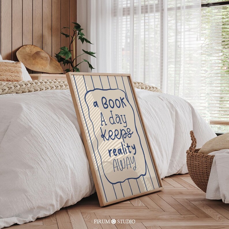 Whimsical hand-drawn wall art featuring the quote “A Book A Day Keeps Reality Away” in playful navy-blue lettering on a cream background with vertical wavy stripes and a doodled frame. This charming printable is perfect for book lovers, cozy reading nooks, or eclectic dorm decor. A delightful mix of humour and escapism, ideal for adding personality to your digital download art collection or gifting to fellow bibliophiles.