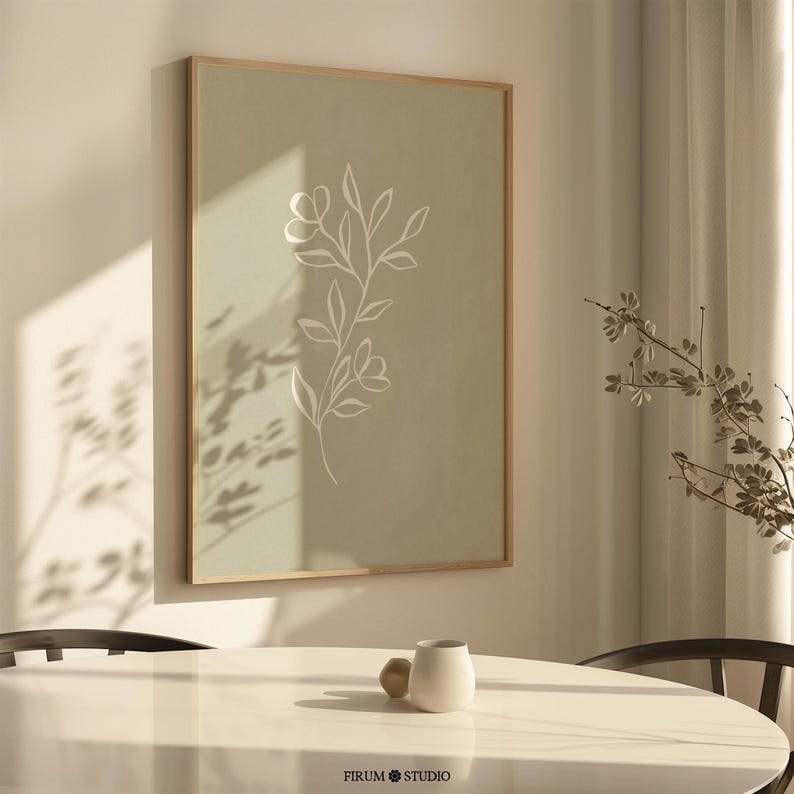 Sage green minimal botanical printable wall art featuring elegant floral line drawings in a muted green palette. This digital artwork blends minimalist aesthetics with modern decor, perfect for stylish apartments, living rooms, and gallery walls. Available as a high-resolution digital download for instant printing