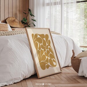 Abstract botanical art print in muted yellow ochre tones, perfect for modern home decor. This chic, downloadable art adds warmth to any space, ideal for those seeking minimalist and trendy wall decor