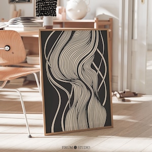 May include: Abstract art print with black and white wavy lines. The print is framed in a natural wood frame.