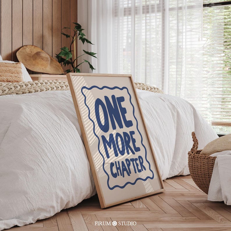 Minimalist book lover quote wall art featuring the phrase “One More Chapter” in bold, playful navy-blue lettering inside a hand-drawn squiggly border on a soft cream background. Perfect for cozy reading corners, modern bedrooms, or literary-themed dorm decor. This downloadable art print is ideal for bibliophiles and readers who just can’t put the book down. A quirky and stylish digital artwork for instant download.