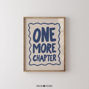 Minimalist book lover quote wall art featuring the phrase “One More Chapter” in bold, playful navy-blue lettering inside a hand-drawn squiggly border on a soft cream background. Perfect for cozy reading corners, modern bedrooms, or literary-themed dorm decor. This downloadable art print is ideal for bibliophiles and readers who just can’t put the book down. A quirky and stylish digital artwork for instant download.