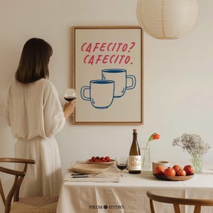 Modern Spanish-inspired coffee wall art featuring a stylish cafecito design. This printable artwork blends minimalist coffee shop aesthetics with warm neutral tones, perfect for coffee bars, kitchens, and cozy breakfast nooks. Available as a high-resolution digital download for instant printing