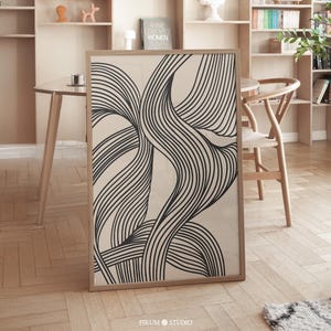 This Black Abstract Wave Art Print features bold, flowing lines that create an elegant and dynamic visual impact. The minimalist design, with its black and white color palette, perfectly fits modern and mid-century decor. Ideal for contemporary living rooms, bedrooms, or offices, this art piece brings sophistication and balance to any space. Instantly downloadable, it’s a stylish addition to any home, offering both modern charm and timeless appeal for those who appreciate minimalist aesthetics.