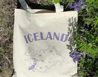 Iceland Tote Bag - Outline of Iceland Tote Bag with Arctic Fox, Puffin, and Mountain Aven Flower design