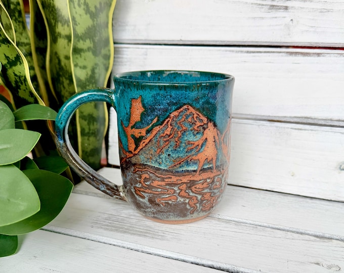 Handmade Ceramic Dragon Mug: Electric Blue Resist Mountain Design