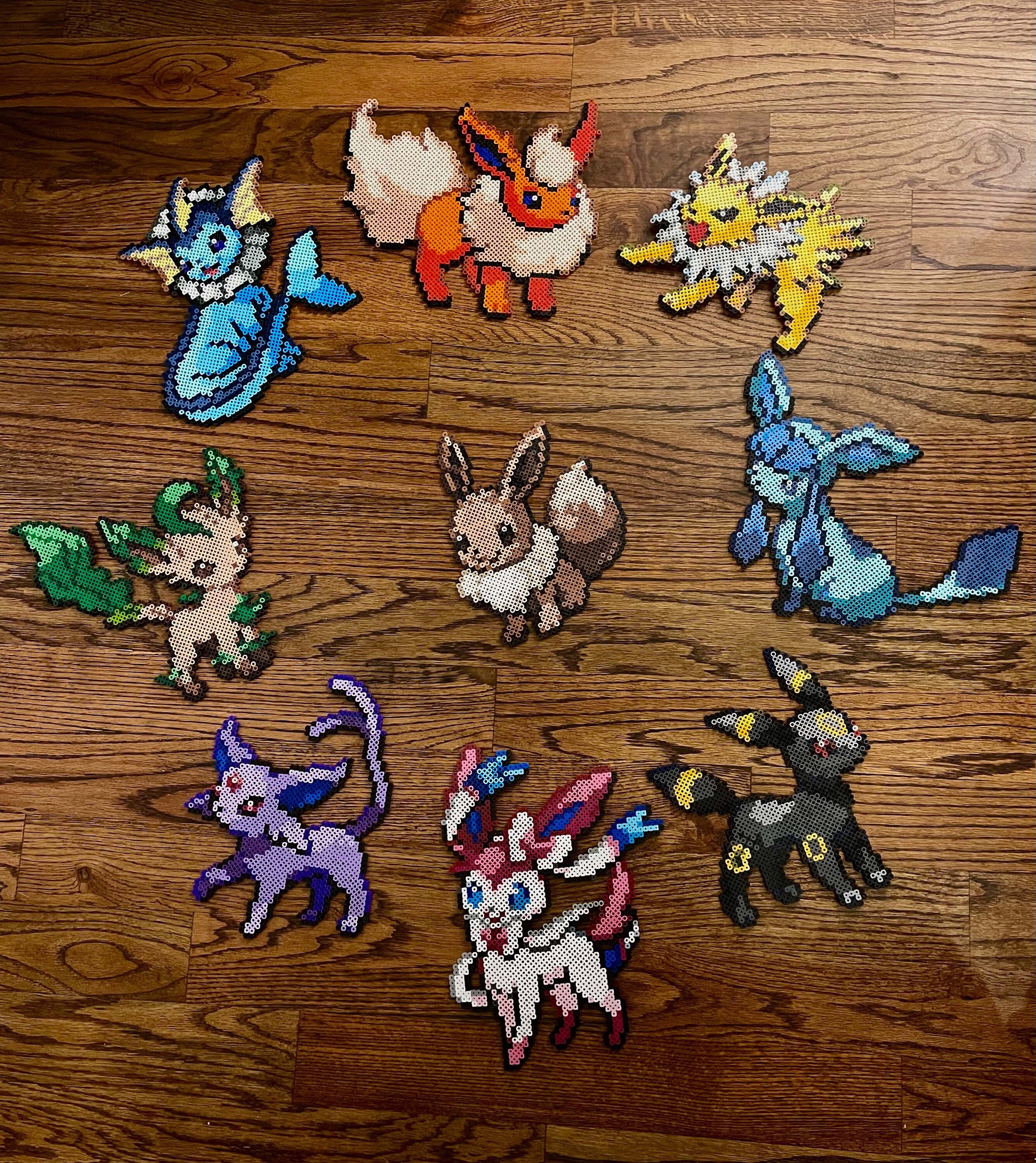 Pixel Art Evoli Et Ses évolutions Eeveelution Pixel Art - Etsy France