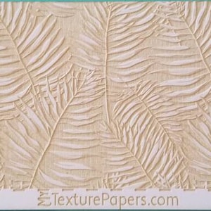 May include: A beige textured wallpaper with a repeating pattern of white palm leaves. The wallpaper has a subtle linen-like texture. The text "TexturePapers.com" and "Design 100233" is printed at the bottom of the image.