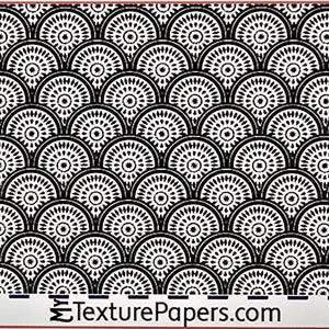 May include: Black and white repeating pattern of stylized circles with a design inside each circle. The pattern is reminiscent of fish scales. The text "Design 100690" is at the bottom right of the image.