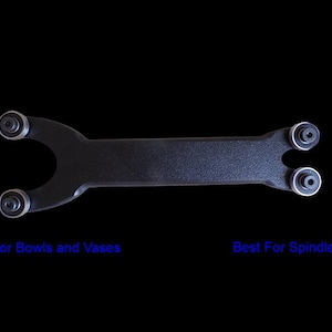 May include: A black tool with a curved end and two rollers, and a straight end with two rollers. Text in blue reads "Best for Bowls and Vases" and "Best For Spindles".
