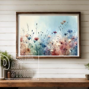May include: A watercolor painting of a field of wildflowers in shades of blue, pink, and white. The flowers are set against a soft blue background with a hint of yellow.