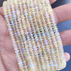 AAA+ Natural Yellow Base Flashy Ethiopian Opal Smooth Rondelle Beads | 3.5-6 MM Welo Opal Bead | Opal Rondelle Beads | Opal Beads Suppliers