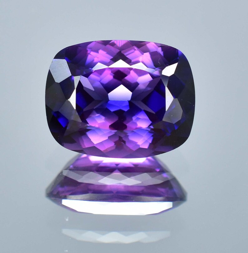 Gemma sciolta da 22,50 ct di zaffiro bicolore viola blu viola giava prugna da 18 x 14 mm, certificata GIT, da utilizzare per realizzare anelli e pendenti con pietre preziose di fiordaliso immagine 3