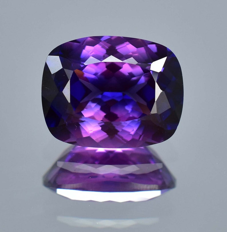 Gemma sciolta da 22,50 ct di zaffiro bicolore viola blu viola giava prugna da 18 x 14 mm, certificata GIT, da utilizzare per realizzare anelli e pendenti con pietre preziose di fiordaliso immagine 6