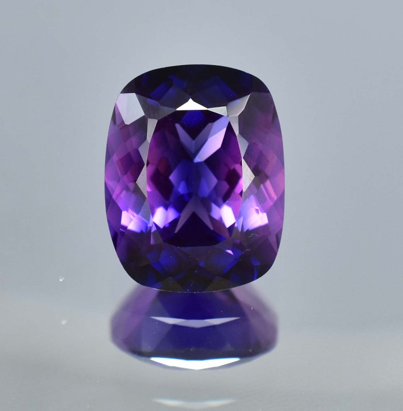 Gemma sciolta da 22,50 ct di zaffiro bicolore viola blu viola giava prugna da 18 x 14 mm, certificata GIT, da utilizzare per realizzare anelli e pendenti con pietre preziose di fiordaliso immagine 5