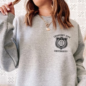Crescent City University CCU Crest Sweatshirt | OFFICIALLY LICENSED | House of Earth Blood Sky Breath Sarah J Maas Umbra Mortis Light it Up