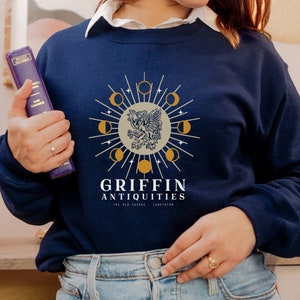 Griffin Antiquities Crescent City Lunathion Sweatshirt | OFFICIALLY LICENSED | Sarah Maas Sjm Crew Neck Hoeab Hosab Merch Ruhn Danaan ToG