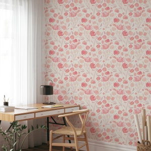 May include: A light pink and white floral wallpaper with a watercolor design. The wallpaper features a repeating pattern of pink flowers and leaves.
