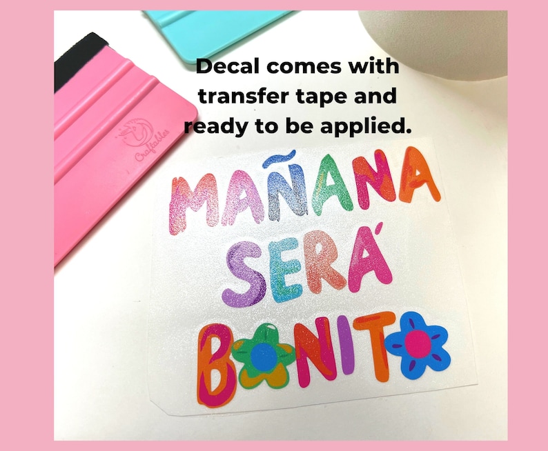 May include: A colorful vinyl decal with the text "MA&Ntilde;ANA SER&Aacute; BONITO" in a rainbow of colors with a flower design. The decal comes with transfer tape and is ready to be applied.