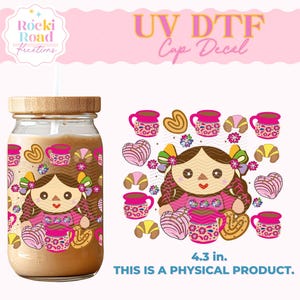 May include: A UV DTF cup decal featuring a colorful illustration of a traditional Mexican doll with a pink dress, brown hair, and flowers in her hair. The doll is surrounded by pink and yellow pastries, coffee cups, and other decorative elements. The decal is 4.3 inches in diameter.  "UV DTF Cup Decal" is written in pink and yellow text.