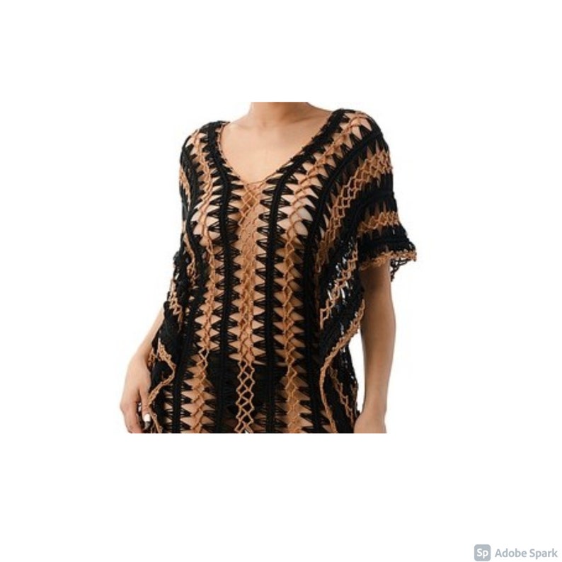 May include: A black and brown crochet cover-up with a V-neck and short sleeves.