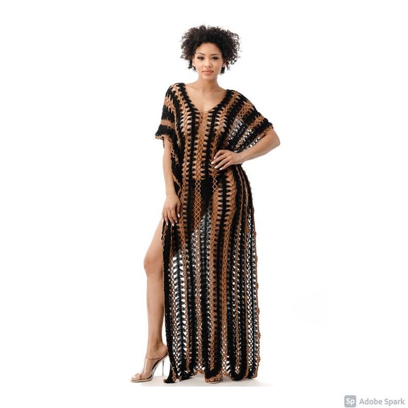 May include: A black and brown crochet maxi dress with a V-neckline and side slits. The dress is made of a lightweight, breathable fabric and is perfect for a day at the beach or a summer evening.