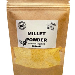 May include: A brown paper pouch with a clear window showing yellow millet powder. The label reads "Millet Powder (Panicum Virgatum) Organic".