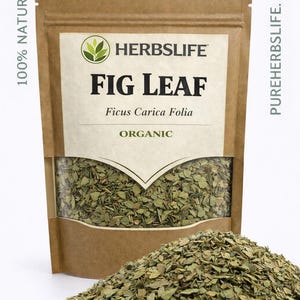 May include: A brown paper bag of dried fig leaves with the text "FIG LEAF" and "ORGANIC". A pile of dried fig leaves is in front of the bag. The bag has the text "100% NATURAL" and "PUREHERBSLIFE.com".