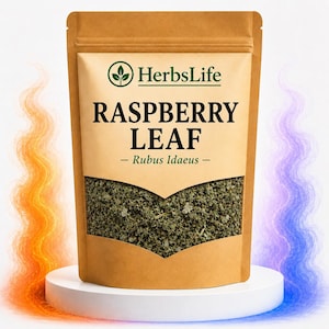 May include: A brown kraft paper pouch containing dried green raspberry leaf, labeled HerbsLife RASPBERRY LEAF - Rubus Idaeus -. The pouch features a clear window displaying the dried herbs and is positioned on a white circular pedestal.